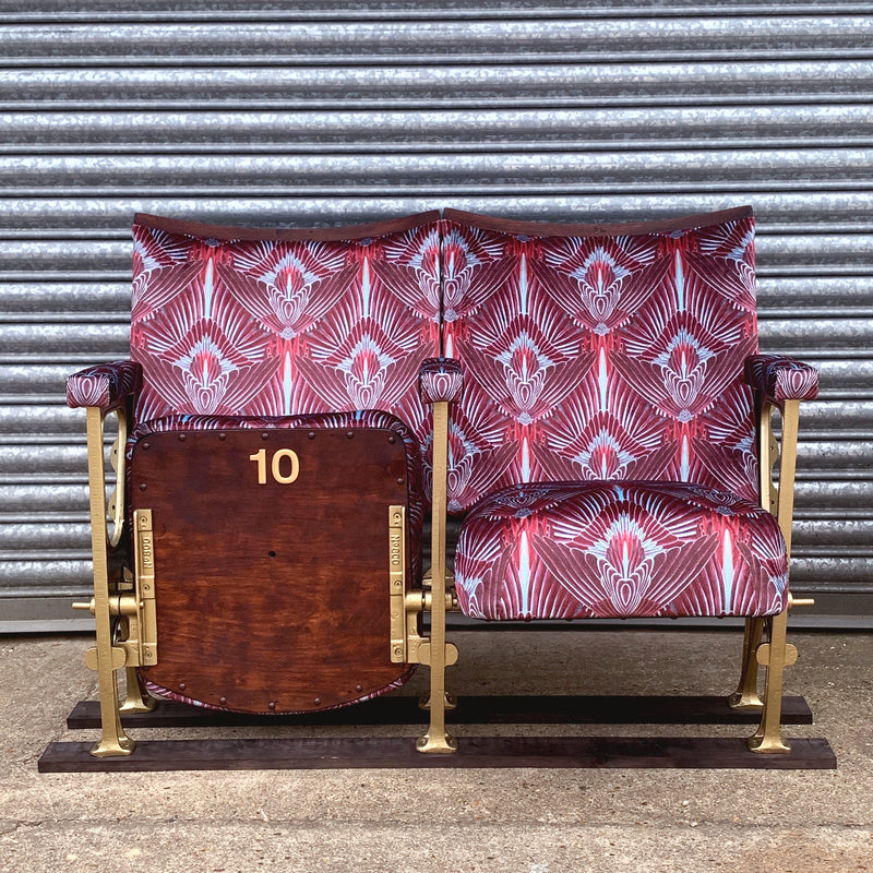 A set of two vintage cinema seats upholstered in 'Gershwing' velvet by Divine Savages