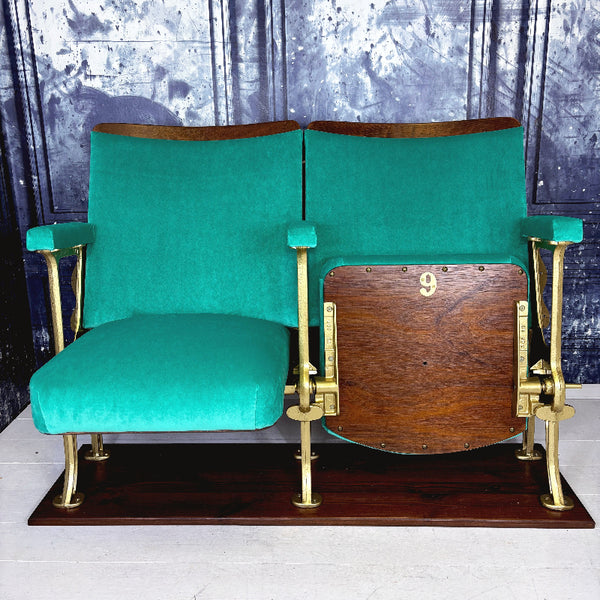 set of two refurbished vintage cinema seats with jade green velvet.